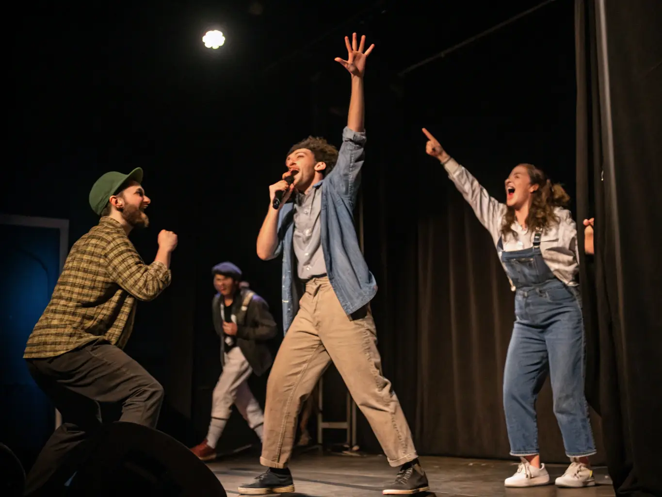 A dynamic image of a live improvisational theatre performance, capturing the energy and excitement of the actors and the audience.